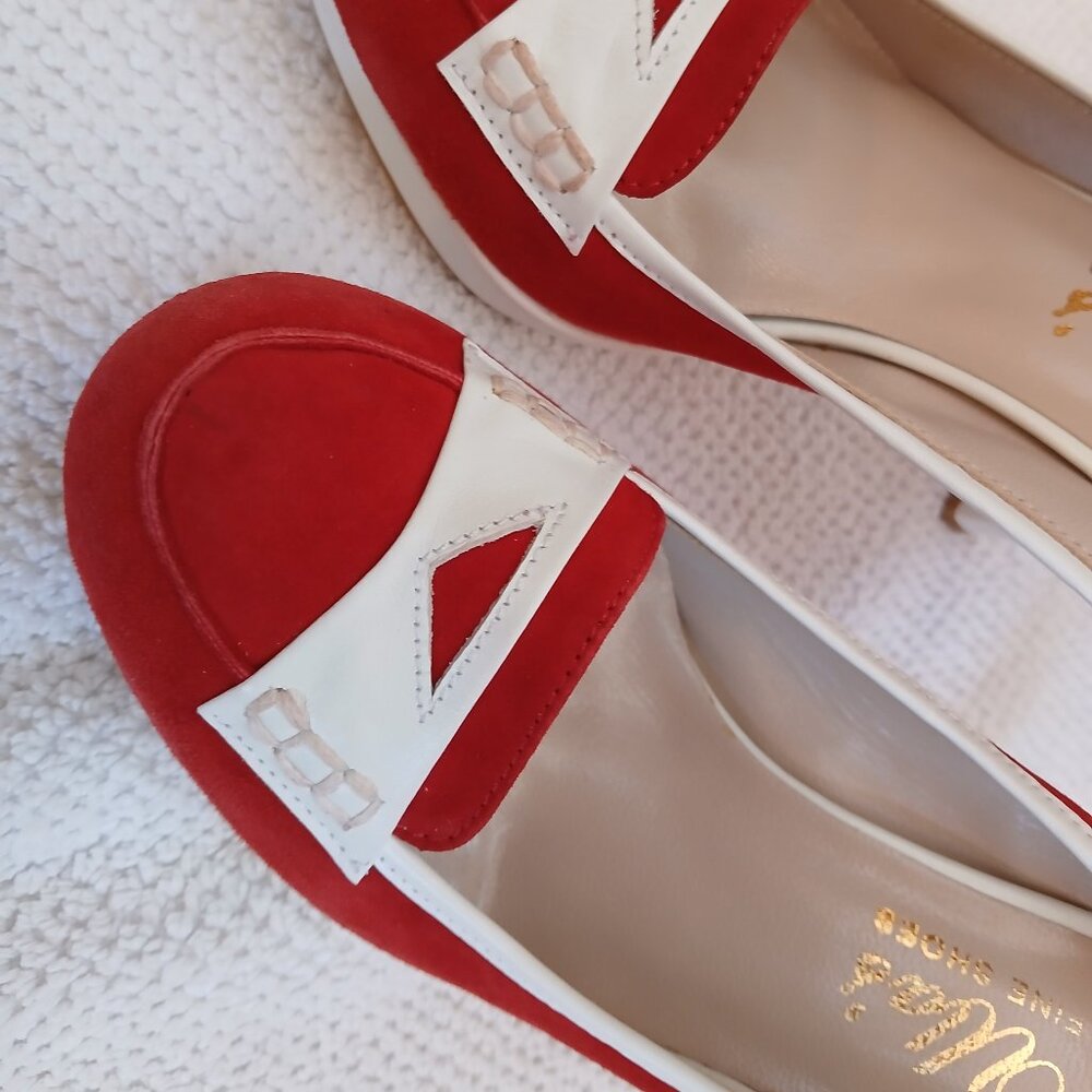 Vibrant suede leather new and unworn pumps.